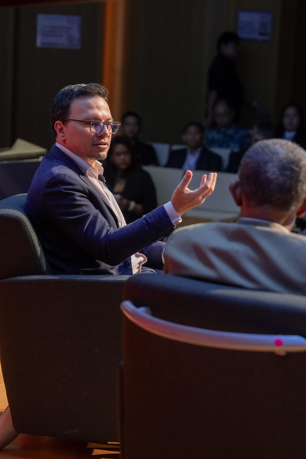 A fireside conversation on stage
